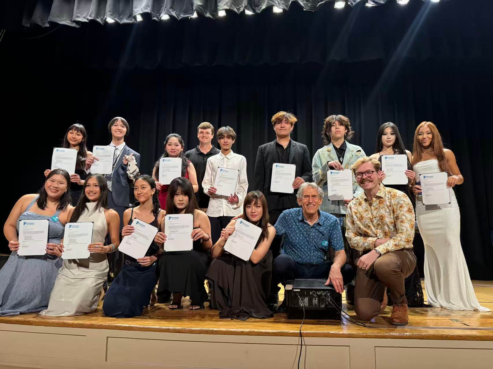Group photo with performers